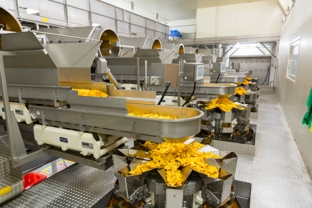 Tijdens de retrofit van de chipsproductielijn werd een overkoepelende veiligheidssturing met PNOZmulti 2 toegepast