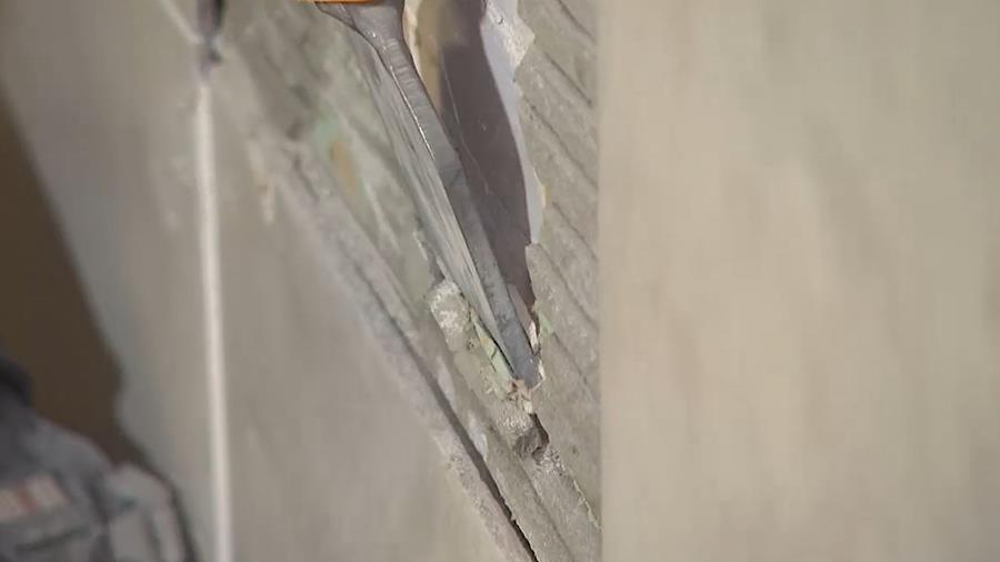 wegbeitelen tegel herstellen
