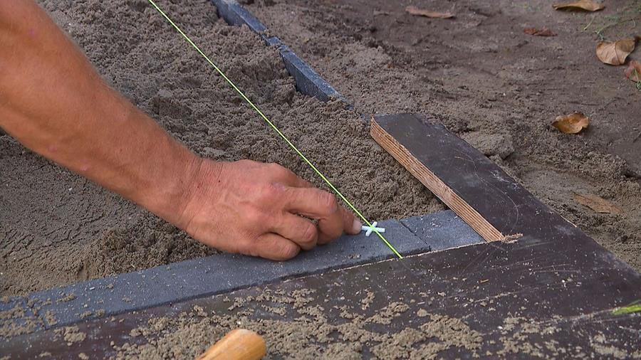Afwatering terras tegelkruisje